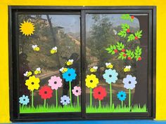 the window is decorated with flowers and bees