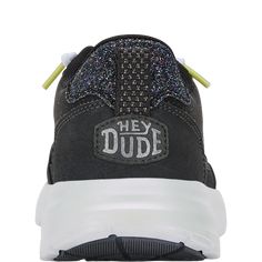 HEYDUDE | Women's Sneakers | Sirocco Alta Glitter Shine - Black | Size 7 - Athleisure reaches all new heights in Sirocco Alta Glitter Shine. We mixed our classic mesh top in with an elevated metallic faux leather toe bumper and heel to see fashion meet function. Throw in heel loops for easy pull-on and lateral stitch cage detailing and these shiny sneaks will stay on foot all day long.Shoe Specs: Slip-On Stretch Lace Mesh top Synthetic toe bumper and heel Padded tongue, collar and heel counter E Black Sporty Sneakers With Glitter Accents, Sporty Black Sneakers With Glitter Accents, Low-top Glitter Sneakers For Sports, Sporty Glitter Sneakers For Streetwear, Glitter Print Lace-up Sneakers For Streetwear, Casual Sneakers With Glitter Print, Casual Low-top Sneakers With Glitter Print, Casual Glitter Sneakers For Streetwear, Casual Glitter Print Sneakers