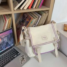 Classy Commuter Canvas School Bag backpack Bobo's House White and Purple Stripe Portable Crossbody Canvas Bag For School, Trendy Portable Crossbody Canvas Bag, Trendy Square Shoulder Bag For School, Casual Square Back To School Bag, Casual Square Back-to-school Bags, Trendy Portable Canvas Bag For Everyday Use, Large Capacity Purple Bag For Back To School, Large Capacity Rectangular Shoulder Bag For Back To School, Cute Large Capacity Shoulder Bag For Back To School