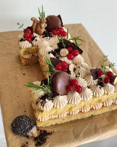 a piece of cake that has been decorated with berries and other toppings on it