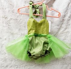 Tinker Bell sequin tutu Romper Custom orders welcomed Care instructions: Handwash cold water, hang to dry Green Tutu Dress For Summer Parties, Green Summer Party Tutu Dress, Fitted Glitter Tulle Tutu Dress For Summer, Summer Dress-up Glitter Tulle Tutu Dress, Summer Party Stretch Tutu Dress, Fitted Tutu Dress For Summer Costume, Fitted Summer Costume Tutu Dress, Summer Glitter Tulle Tutu Dress For Dress-up, Fitted Tutu Dress For Summer Festivities