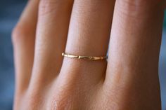 Whimsical handmade chisel band ✨ Handmade 14k gold fill or 925 Sterling Silver soldered band, which are perfect for everyday wear, and those of you who are minimalistic! Beautiful statement piece, which gives off an etherial look 🦋✨ MATERIAL: 14/20 (karat/purity) gold fill OR 925 Sterling Silver THICKNESS: 1.32 mm Each are uniquely hand crafted!💕 Handmade Yellow Gold Minimalist Stackable Rings, Handmade Minimalist Yellow Gold Stackable Rings, Handmade Minimalist 14k Gold Midi Rings, Minimalist Handmade Yellow Gold Stackable Rings, Handmade Minimalist Midi Rings In Yellow Gold, Handmade Minimalist Yellow Gold Midi Rings, Dainty Gold Bands As A Gift, Minimalist Gold Bands For Gifts, Dainty Bands With Simple Design For Gift