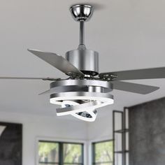 a ceiling fan in a modern living room