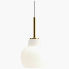 a white and gold light hanging from a ceiling