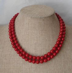 PREFERENTIAL POLICIES : The order is $50 or more.There will be a 10% discount.long-term effective. Please use the coupon code: CZH10 Welcome back to my shop: https://www.etsy.com/shop/pearlandjewelry Description of the product in the picture: The necklace is 17-18 inches long ,and I make them with 8mm Bright red shell pearl,2 strands shell pearl necklace, It is nice for your wedding. If you need the other lengh or size ,Please feel free contact me.Thank you so much, :) If you need to buy a lot.I Handmade Red Round Bridal Necklace, Red Single Strand Necklace For Wedding, Red Pearl Necklace, Ivory Pearl Necklace, Necklace Shell, Pink Pearl Necklace, Black Pearl Necklace, Red Pearl, Wedding Bridesmaid Jewelry