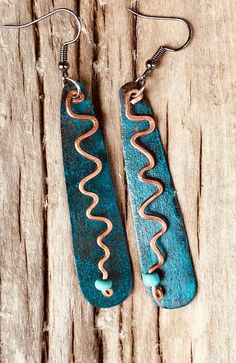 Hand crafted oxidized copper earrings with copper wire and turquoise beads. Made in Gunnison Colorado Turquoise Copper Earrings, Turquoise Artisan Electroformed Earrings, Artisan Turquoise Copper Earrings, Artisan Turquoise Earrings In Copper, Handmade Turquoise Earrings With Copper Wire, Turquoise Wire Wrapped Copper Earrings, Turquoise Patina Copper Jewelry, Gunnison Colorado, Oxidized Copper