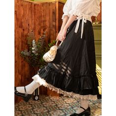 Summer Ruffled Black Skirt Material: 100% Polyester Size: Free Size Color: Black Applicable Season: Spring, Summer, Fall Summer Black Ruffled Petticoat, Black Ruffled Petticoat For Summer, Spring Black Flowy Petticoat, Spring Black Petticoat, Black Flowy Petticoat For Spring, Summer Black Skirted Petticoat, Black Skirted Summer Petticoat, Black Tiered Skirt With Ruffles, Black Ruffled Skirt For Spring