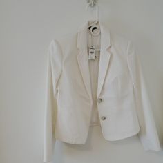 Size 4 White Casual Outerwear For Office, Casual White Outerwear For Office, Tailored White Blazer For Spring, Classic White Blazer For Spring, White Tailored Casual Outerwear, White Spring Blazer With Button Closure, Spring Workwear Blazer In Winter White, White Outerwear For Spring Workwear, Classic Winter White Blazer For Spring