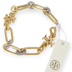 Crystal Pave Take The Roxanne Chain Bracelet From Day To Evening. Wear It Solo Or Layered With Other Bracelets. Also Available In The Matching Ring And Necklace! 18k Gold-Plated Brass, Crystal Hinge Clasp Length: 7.25" Tory Burch Jewelry, Matching Ring, Matching Rings, Womens Jewelry Bracelets, Evening Wear, Chain Bracelet, Tory Burch, Silver Gold, 18k Gold