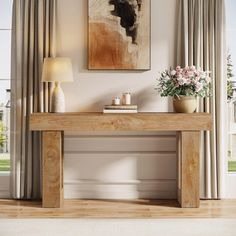 a wooden table sitting in front of a window next to a vase with flowers on it