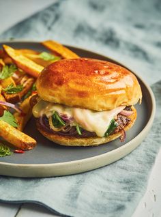 a sandwich and french fries on a plate