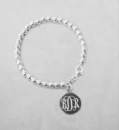 "Sterling Silver Bead Bracelet with Engrave Circle Pendant. we can say... simplicity, best...ever, 5 mm,6 mm, 8mm thickness bead, Solid silver disc, 22 years monogram expertise we like to share with you.. \"this is one of buyers review on Aug 10 2020 First of all, I placed my order on Thursday and I got it Monday afternoon (this was very fast considering I ordered something else from Etsy the same day) I live in upstate New York, by the w Thank you for your fast service. Second, thank you for th Silver Infinity Bracelets, Monogram Bracelet, Monday Afternoon, Silver Heart Bracelet, Sterling Silver Bead Bracelet, Silver Bead Bracelet, Silver Bead, Gorgeous Jewelry, Circle Pendant