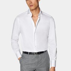 This white shirt is tailored to a formal tailored fit and features a high widespread collar, single cuffs, french placket & mother of pearl buttons. Elegant Long Sleeve Dress Shirt For Semi-formal Occasions, White Collared Business Shirt, Elegant Custom Fit Shirt For Semi-formal Occasions, Modern Formal Top With Lapel Collar, Modern Tailored Shirt For Business Casual, Elegant Custom Fit Dress Shirt For Semi-formal Occasions, Timeless Shirt With Lapel Collar For Office, Modern White Dress Shirt For Semi-formal Occasions, Elegant Semi-formal Custom Fit Dress Shirt