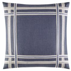 a blue and white striped pillow on a white background