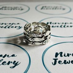 Adjustable swimming fish ring.  Size: The ring is adjustable between UK sizes K 1/2 - S, and US sizes 5.5 - 9. Width: 10mm.  Weight:3g. Item will be dispatched from Ipstones, UK, within 1 working day.  If you are purchasing from the USA or Europe and would like the option to track your parcel please select 'add delivery upgrade' at the checkout. Sea Ring, Sea Rings, Ocean Ring, Fish Ring, Swimming Fish, Pillow Box, Lovely Shop, Ring Photos, Adjustable Ring