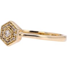 Find inspiration in the details of elegance and sophistication with the 14K Yellow Gold Diamond Hexagon Ring. This exquisite piece features a stunning diamond as its main stone, exuding brilliance and charm. With a total diamond weight of 0.11 carats, every facet captures and reflects light with mesmerizing allure.Crafted in 14K yellow gold, this ring epitomizes luxury and timeless beauty. Its hexagonal design adds a modern flair while maintaining a classic appeal, making it perfect for everyday Timeless Octagon Rose Cut Diamond Ring, Luxury Octagon Diamond Ring With Single Cut Diamonds, Octagon Diamond Promise Ring, Diamond White Octagon Cubic Zirconia Ring, 14k Gold Diamond Ring With Asscher Cut Accents, 14k Gold Asscher Cut Diamond Ring With Accents, Diamond White Octagon Diamond Ring For Promise, Diamond White Octagon Promise Ring, Octagon Gold Diamond Ring With Diamond Accents