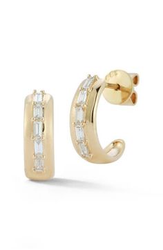 These hoop earrings featuring baguette diamonds are set in 14-karat gold and make the perfect luxe accessory for your lobes. 3/8" drop; 1/8" width Post back Total diamond weight: 0.22ct. Color: G–H Clarity: SI 14k gold/diamond Imported >Diamond Guide Small Hoop Earrings In Yellow Gold With Baguette Diamonds, Small Hoop Yellow Gold Earrings With Baguette Diamonds, Yellow Gold Diamond Hoop Earrings With Baguette Diamonds, Yellow Gold Hoop Diamond Earrings With Baguette Diamonds, Yellow Gold Baguette Diamond Hoop Earrings, 14k Gold Hoop Earrings With Baguette Diamonds, Small Hoop Huggie Earrings With Baguette Diamonds, Classic 14k Gold Hoop Earrings With Baguette Diamonds, Fine Jewelry Yellow Gold Hoop Earrings With Baguette Diamonds