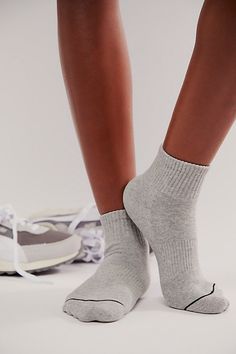 Forever cool and classic, these timeless crew socks are featured in a staple silhouette with ribbed top trim and varsity-inspired FP Movement buti logo for and added sporty touch. **Features:** Crew style, ribbed top hem, sporty embroidered logo, contrast toe and heel **Why We ❤ It:** Designed to take any fitness ‘fit up a notch, these go-with-anything socks are sure to be a staple in your athletic accessories collection. | Crest Buti Socks by FP Movement at Free People, Grey Casual Sports Socks For Spring, Sporty Spring Streetwear Socks, Winter Sporty Socks With Ribbed Cuffs, Sporty Winter Socks With Ribbed Cuffs, Sporty Stretch Ribbed Socks, Casual Gray Sports Socks, Sporty Stretch Socks For Streetwear, Sporty Winter Socks For Streetwear, Athletic Accessories