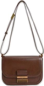 Chic Business Saddle Shoulder Bag, Chic Business Crossbody Saddle Bag, Chic Formal Satchel Saddle Bag, Chic Formal Saddle Bag Satchel, Versatile Brown Evening Satchel, Versatile Brown Satchel For Evening, Formal Versatile Saddle Bag, Versatile Saddle Bag In Satchel Style For Formal Occasions, Versatile Satchel Saddle Bag For Formal Occasions