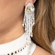 Size: Length: ''/ Width: '' White Pierced Chandelier Earrings For Formal Occasions, Formal White Pierced Chandelier Earrings, Elegant White Drop Chandelier Earrings, White Teardrop Chandelier Earrings, White Single Dangle Clip-on Earring, Handmade White Dangle Clip-on Earrings, Formal Beaded Dangle Earrings, White Dangle Pierced Jewelry, White Pierced Crystal Earrings As Gift