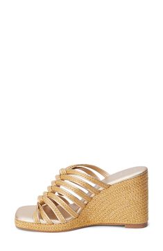 Braided raffia straps weave into one another on this stunning wedge sandal that'll have you ready to hit the cabana in style. 3 3/4" heel; 3/4" platform Textile upper/synthetic lining and sole Imported Elegant Heels For Beach Season Vacation, Elegant Heels For Beach Vacation, Elegant Straw Heels For Vacation, Straw Wedge Heel Sandals For Beach Season, Straw Wedge Sandals For Beach Season, Elegant Straw Platform Wedge Sandals, Vacation Stacked Wedge Heels, Elegant Wedge Heel Sandals For Beach, Elegant Open Toe Wedge Sandals For Beach Season