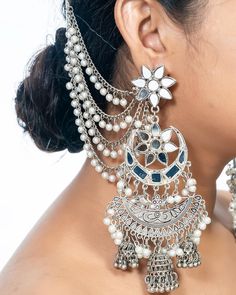 Long Indian Ghungroo Mirror Chandbali Dangle Jhumka Earrings Oxidized Beautiful Multilayer Dangler for Women Antique Designed Unique Earring These stylish Ghungroo Earrings from VASTRABHUSHAN will certainly leave you spellbound. These Dangler have an excellent finish and gives out an exquisite sense of style. If you are looking for an amazing Fashion Jewelry for special occasions such as Anniversary, Engagement, Party, Wedding or for gifting , then your search ends here. The look is stunning and Silver Chandelier Earrings With Cutdana For Festivals, Ghungroo Earrings, Jhumkas Aesthetic, Oxidised Jhumka, Oxidized Earrings, Unique Earring, Earrings With Pearls, Flowy Design, Jewelry Antique