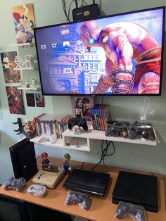 a flat screen tv sitting on top of a wooden table