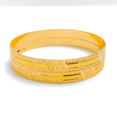 Step out in style with our Striped Machine Cut Bangles. Crafted from 22k gold with a weight of 28.5 grams, these yellow gold bangles are perfect for any occasion. With a bangle size of 2.2 and an opening diameter of 2.15", they are available in a set of 2 pieces. The intricate machine cut stripes on the surface of the bangles are sure to make a statement. PRODUCT DETAILS Gold Purity(karat): 22k Gold Weight(grams): 28.5 Item Finish: Yellow Gold Bangle Size: 2.2 Bangle Opening(diameter): 2.15" Num Yellow Gold-plated Bangle Bracelet, Festive Yellow Gold Cuff Bracelet, 22k Yellow Gold Bangle Bracelet, 22k Yellow Gold Bangle For Formal Occasions, Festive Yellow Gold Bangle Bracelet, Yellow Bangle Bracelets For Ceremonial Occasions, 22k Gold Round Bangle, 22k Yellow Gold Ceremonial Bangle, Festive 22k Yellow Gold Bangle