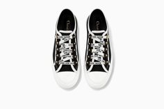 Low-top trainer in black canvas - Tênis Dior Logo Reference, Black Canvas Shoes, Designer Slides, Dior Sneakers, Casual Sportswear, Canvas Shoes Women