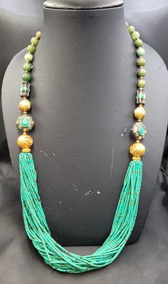 It's Beautiful Handmade Tinny Beautiful Necklace Its Turquoise Beads With Gold Plated Its Handmade Tinny Beads Its very Beautiful Handmade Necklace From Afghanistan Handmade Vintage Green Authentic Turquoise Beads Beautiful Necklace With Green Jade Stone Necklace Material Gold Plated  Gemstone Turquoise And Jade  Length 65cm Traditional Green Faceted Beaded Necklaces, Traditional Green Faceted Beaded Necklace, Elegant Turquoise Beads With Natural Stones, Green Faceted Beads Necklaces For Festivals, Green Artisan Necklace For Festive Occasion, Green Faceted Beads Necklace For Festivals, Festive Green Artisan Necklace, Artisan Turquoise Necklace With Faceted Beads, Elegant Hand-strung Turquoise Beaded Necklaces