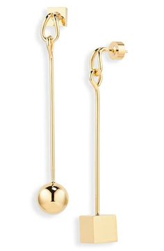 Sleek and dimensional, these mismatched drop earrings feature a modern geometric design that elevates everyday looks. Post back Goldtone plate Made in Italy Modern Sphere Earrings With Polished Finish, Modern Polished Sphere Earrings, Sleek Formal Drop Earrings Jewelry, Sleek Drop Earrings For Formal Occasions, Sleek Formal Drop Earrings, Minimalist Long Drop Earrings With Polished Finish, Modern Sphere Earrings, Minimalist Polished Earrings For Evening, Contemporary Drop Earrings For Formal Occasions