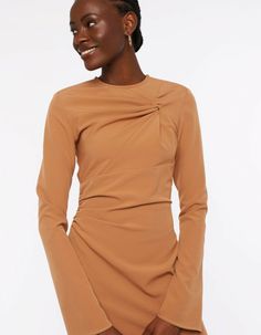 An elevated piece that speaks to evening dressing, the ESCAPADE dress features a twist at the front and ruched details taht gather the fabric creating a flattering look. With the side slits it is a chic answer to occasionwear.The model is 178 cm and wears a size S.Composition: 51% RPES, 39% PES, 10% ELMachine wash delicate 30 celsius, do not bleach, iron on a low temperature without steaming, do not tumble dry, do not dry clean. Shine may appear while ironing.Size and fit:To make sure you choose the right piece, please follow the size chart below! XS S M L XL Chest 84 cm 88 cm 92 cm 96 cm 102 cm Waist 66 cm 70 cm 74 cm 78 cm 84 cm Hip 94 cm 98 cm 102 cm 106 cm 112 cm Arm length 69 cm 59,5 cm 71 cm 71,5 cm 73 cm Arm width 30,5 cm 31,5 cm 32,5 cm 33,5 cm 35 cm Front length 129 cm 130 cm 132, Pre-draped Ruched Mini Dress, Pre-draped Ruched Dresses For Date Night, Chic Mini Dress With Ruched Back For Formal Events, Chic Formal Mini Dress With Ruched Back, Evening Mini Dress With Ruched Sides, Asymmetrical Ruched Mini Dress, Ruched Draped Mini Dress For Dinner, Asymmetrical Mini Dress With Ruched Bodice For Evening, Elegant Mini Dress With Ruched Bodice For Dinner