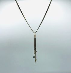 *About me: 925 silver necklace. Veronese tassel necklace with dangling cubic zirconia gem stones. tantalizing tassel neck treasure! *Size: Approx. length 46cm / 18 inches , width 0.4cm / 0.15 inches at widest, tassel length 8.5cm / 3.34 inches *Weight: Approx. 11.8 grams *Hallmark: Italy, 925 *Sponsor: DQCZ, V (Diamonique Cubic Zirconia and Veronese)  *Age: Vintage *Condition: Good vintage condition *Gift boxed to your door ** A vintage item that has been pre-loved, history of wear appropriate t Silver Lariat Diamond Necklace With Adjustable Chain, Luxury Dangle Tassel Jewelry, Silver Diamond Long Drop Necklace, Elegant Jewelry With Dangling Charms, Silver Necklace With Detachable Dangle Pendant, Silver Dangle Necklace With Detachable Pendant, Elegant Long Drop Tassel Jewelry, Elegant Lariat Necklace With Silver Chain And Gold Color, Elegant Silver Chain Dangle Necklace