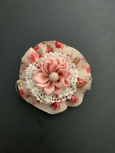 This brooch gives the extra wow factor to any outfit. It is a unique brooch that will add a touch of elegance to any dress or outfit. It can also be used with casual outfits for that unique look. Colors are lt. pink, white and beige. Silver metal back. Elegant Pink Flower Pins, Elegant Handmade Pink Brooches, Unique Pink Brooches For Party, Shabby Chic Flowers, Fabric Brooch, Unique Brooch, Tulle Flowers, Chic Flowers, Floral Brooch