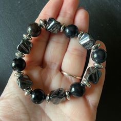 Precious Stones - Hematite & Black Onyx - Silver Tone Bead Spacers - Never Worn, Brand New Without Tags. Looks Great Worn Alone Or Stacked With Other Bracelets - Perfect For Dressing Up And For Casual Occasions Too! Black Hematite Beaded Bracelets With Faceted Beads, Adjustable Black Stretch Bracelet With Silver Beads, Black Hematite Faceted Beaded Bracelets, Silver Hematite Beaded Stretch Bracelet, Silver Stretch Bracelet With Black Beads, Elegant Adjustable Hematite Stretch Bracelet, Silver Hematite Jewelry With Black Beads, Elegant Silver Obsidian Bracelets, Adjustable Silver Obsidian Beaded Bracelets