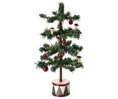 a small christmas tree in a pot with ornaments on it's top and bottom