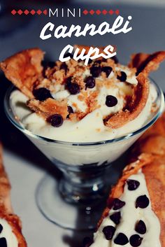 a dessert with chocolate chips and cream in a glass bowl