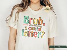 As a middle school English teacher, I know that students need a daily reminder to use a capital letter! Bruh, come on!  This brand of shirt is everyone's favorite. It's incredibly soft, lightweight, not boxy, just the right amount of stretch, comfortable yet cute. Your new go-to tee from Bella + Canvas. I use direct to garment printing, which prints the color directly into the shirt to ensure no cracking or peeling like vinyl or screen printing. Be sure to check out my other designs! https://www Cute Teacher Shirts Shirts By Sarah, Elementary Teacher Shirts Sweatshirts, Write On Shirt, Middle School Teacher Outfits, Teacher Core, School Teacher Outfits, A Capital Letter, Future Educator, Teacher Crafts