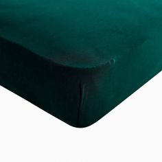 an image of a plain green bed sheet