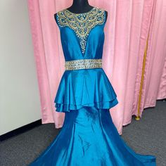 Mac Duggal Gown With Flare Skirt And Gold Beading Detail New Never Worn Blue Embellished Pageant Dress For Wedding, Elegant Fitted Blue Pageant Dress, Embellished Floor-length Mermaid Dress For Pageants, Blue Rhinestone Gown For Prom Season, Embellished Floor-length Pageant Dress, Blue Rhinestone Pageant Dress, Elegant Blue Evening Dress For Pageant, Pink Mermaid Dress, Red Satin Gown