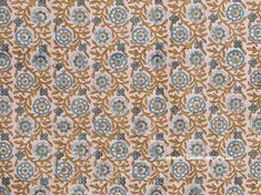 an image of a blue and brown flower pattern on fabric or material that looks like cloth