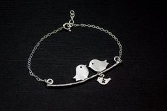 **1 Baby bird-  representation of a happy family adjustable chain bracelet* High quality sterling silver  chain  (All findings are sterling silver  .) Length is adjustable from 6 3/4 to 7 1/4 inches. * Branch charm -16k white gold plating over brass                                 size-1 3/4" / 48mm   Please let me know your choice of 1 letters at the 'note to seller' area during check out.***Add birthstone**https://www.etsy.com/listing/128628999/for-dorocy-jewelry-buyer-only-will-not*Item comes Mother Bracelet, Initial Charm Bracelet, Mothers Bracelet, Baby Bird, Bracelet Sterling Silver, Happy Family, Initial Charm, Charm Bracelets, Gift For Mom