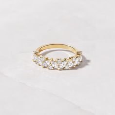 A beautiful multi-stone ring, featuring marquise and round stones, make this an excellent wedding band or just a brilliant addition to your ring stack! 2 widths available! A minimalist one (2x4mm stone) or one that makes more of a statement (5x5 stone)! Also available in Solid 14k Gold & Lab Diamonds!! 4mm Thickness Total WT: 2.51 grams Total Carat Weight: .853 carats (Highest grade lab diamonds VVS-VS) Made with 100% Pure Love! ♡ Happy to answer any questions you may have! 🥰 Wedding Band Gold, Diamond Ring Wedding, Promise Ring Gift, Ring Wedding Band, Ring Stack, Ring Promise, Multi Stone Ring, Multi Stone, Stacking Ring