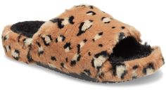 This new cozy Classic Slide features all over soft and fuzzy faux leopard fur. A roomy unisex fit and a deep heel cup makes them light and comfortable to wear. With the warm and cozy material and Croslite™ foam construction, these slide sandals are perfect for cooler days and nights.  Classic Leopard Fur Slide Details:    All over soft and fuzzy faux leopard fur  Incredibly light and fun to wear   Deep, cupped Croslite™ foam footbeds, offering sink-in comfort   Iconic Crocs Comfort™: Lightweight. Flexible. 360-degree comfort. Brown Faux Fur Casual Slippers, Brown Casual Faux Fur Slippers, Casual Brown Faux Fur Slippers, Slide Sandals, 360 Degree, Warm And Cozy, Sandals