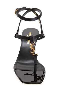 Interlocking YSL hardware brings a golden touch to a silk-kissed-satin square-toe sandal with a strappy profile and demure kitten heel. 2 1/4" (60mm) heel Adjustable strap with buckle closure Textile upper/leather lining and sole Made in Italy Designer Shoes Evening Sandals With Ankle Strap And Gold-tone Hardware, Elegant Ankle Strap Sandals With Gold-tone Hardware, Designer T-strap Heels For Evening, Luxury T-strap Sandals For Evening, Designer Evening Heels With Gold-tone Hardware, Kitten Heel Shoes, Square Toe Sandals, Kitten Heel Sandals, Strap Sandals Women