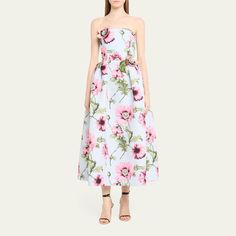 Oscar de la Renta poppies faille dress featuring flower embroidered applique and a pleated waist Strapless neckline Sleeveless Side split pockets Hem falls below the knee A-line silhouette Invisible back zip Polyester/elastane Dry clean Made in USA Sleeveless Floral Applique Midi Dress For Evening, Evening Strapless Sleeveless Dress With Floral Embroidery, Spring Strapless Sleeveless Dress With Floral Embroidery, Floral Embroidered Strapless Dress For Spring, Sleeveless Midi Dress With Floral Applique For Cocktail, Sleeveless Floral Applique Midi Dress For Garden Party, Spring Floral Embroidered Strapless Sleeveless Dress, Spring Strapless Dress With Floral Embroidery, Sleeveless Midi Dress With Floral Applique For Garden Party