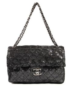 circa 2009 black sequin design leather and chain-link shoulder strap foldover top signature interlocking CC turn-lock fastening main compartment internal slip pocket slip pocket to the rear silver-tone hardware Serial Number: 12857371 Condition: EXCELLENT. This previously owned item is in near-perfect condition with no signs of damage or use. Purchasing this item continues its narrative and reduces the environmental impact by avoiding the use of new resources needed to make the product from scra Sequin Design, Flap Shoulder Bag, Shopping Chanel, Shoulder Bag Black, Boot Pumps, Custom Watch, Derby Shoes, Espadrille Shoes, Environmental Impact