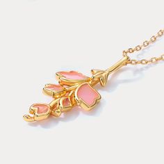 A celebration of spring with the Pink Enamel Sakura Necklace. This delicate Cherry Blossom Necklace, crafted in 10K gold on silver, features a dainty cherry blossom charm adorned with vibrant pink enamel. A symbol of renewal and the annual cherry blossom season in Japan, this necklace captures the fleeting grace of 'Sakura' in an elegant design. Adorned with this charming floral motif, you'll carry the essence of spring wherever you go. Surprise Mom this Mother's Day with our Sakura Flower Necklace. DETAILS Plating: 10K Gold  Materials: 10K Gold on Silver, Enamel Measurements: Length: 15.75 "(40cm) + Extender: 1.97"(5cm) Pendant Size: 0.43"*0.98"(1.1cm*2.5cm) Weight: 2.1 g Sakura Necklace, Cherry Blossom Necklace, Constellation Earrings, Blossom Season, Astrology Jewelry, Astrology Necklace, Cherry Blossom Season, Nature Earrings, Constellation Necklace