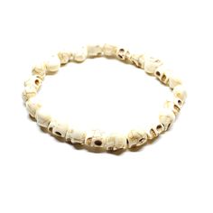 Looking for a one-of-a-kind, stylish, and budget-friendly present for yourself or a loved one? Feast your eyes on this stunning skull bracelet with adjustable elastic band and intricate 8mm skull beads. This unisex jewelry is inspired by Mexican 'Dia de Muertos' and is sure to add a touch of natural gemstone elegance to any outfit. • GET IT FAST!Get it fast! Ready to ship on 1 to 3 business days. • ORDER NOW!Limited Quantities / Limited Edition. • FREE GIFT BOX INCLUDED!Get a Free Craft Gift Box with any order Thank you for shopping with us! ____________________________ * Colors/Designs might slightly vary from actual. Adjustable Skull Jewelry In A Spiritual Style, Adjustable Bone Color Jewelry For Festival, Adjustable Bone-colored Jewelry For Festival, Adjustable Bone-colored Jewelry For Festivals, Adjustable Skull Bracelet As Gift, Adjustable Skull Bracelets As Gift, Adjustable Bone-colored Bracelet, Casual Skull Jewelry For Halloween, Casual Halloween Skull Jewelry