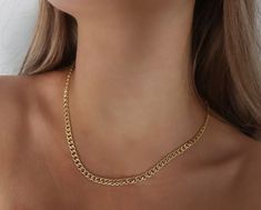 Miami Cuban Chain Necklace | 18k Gold Filled Necklace | Cuban Link Chain | Gold Cuban Curb Chain | Gold Cuban Choker | Medium Thick Chain Timeless, light & comfortable gold jewelry to wear all day, everyday. Stunning piece to wear with layers, charms, or even by itself! Details: Premium quality 18k Gold Filled Materials: Gold on Brass Measurements: Width 5mm - 14 inches long (choker) - 16 inches long - 18 inches long Nickel & Lead Free Hypoallergenic Affordable Gold Chain Choker Necklace, Cheap Gold Clavicle Chain Choker, Cheap Alloy Gold Chain Necklaces, Cheap Gold Necklaces With Box Chain, Cheap Metal Gold Chain Choker, Luxury White Gold Cuban Link Necklace With Curb Chain, Luxury Everyday Curb Chain Necklace, Cheap Everyday Necklaces With Curb Chain, Cheap Alloy Necklaces With Gold Chain